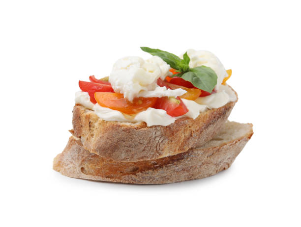 istock Delicious sandwich with burrata cheese and tomatoes isolated on white 1908321019