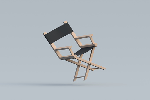 Falling director chair. Movie industry concept. Cinema production. Professional collapsible armchair. Movie premiere. Equipment for studio. 3d render