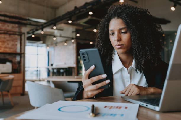 istock Young businesswoman using smartphone 1908372633