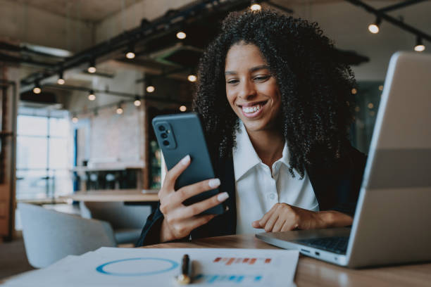 istock Young businesswoman using smartphone 1908373139