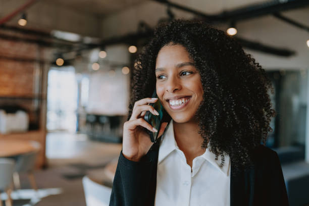 istock Young business woman talking on smartphone 1908380934