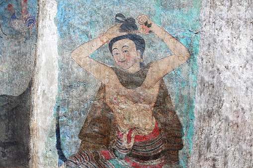 Nan Province ,Thailand- December 22 20123: Mural paintings of women from the ancient period at Phumin Temple, a famous temple in Nan Province, Thailand.