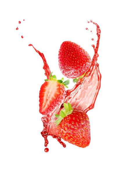 istock Strawberries with splashing juice isolated on white 1908420221