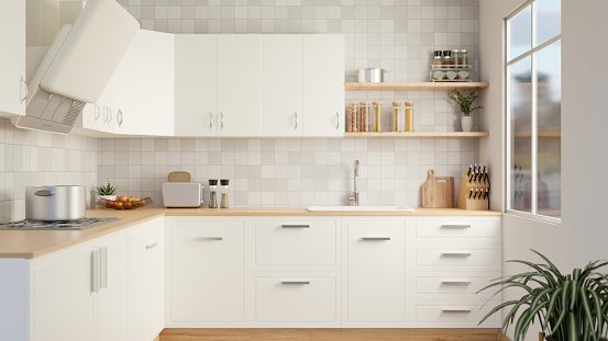 Interior design of a modern, Scandinavian kitchen with white wall cabinets and counters, kitchen appliances, and tiles wall. 3d render, 3d illustration