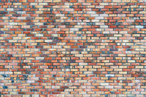 Big and old red brick wall texture