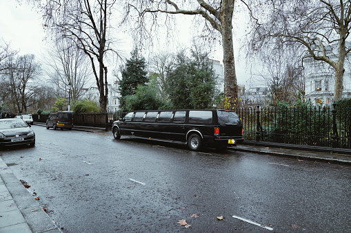 Pembridge Square Street, Pembridge Square Garden in London W2 England United Kingdom - December 30 2022: A Limousine at Pembridge Square Street in Notting Hill Gate, the City of Westminster in west London, the UK.