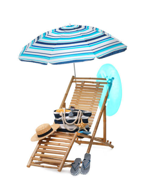 istock Deck chair, umbrella and other beach accessories isolated on white 1908630854