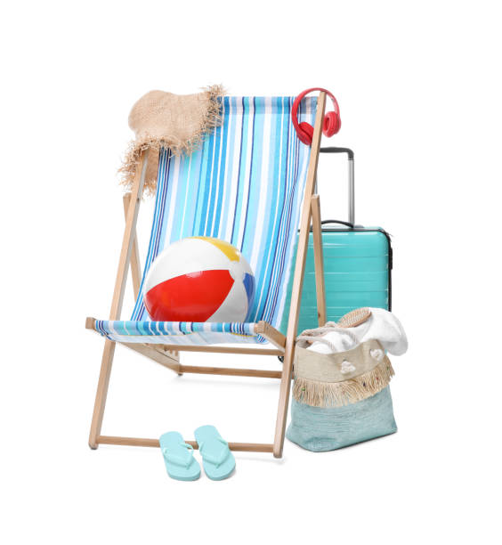 istock Deck chair, suitcase and beach accessories isolated on white 1908630855