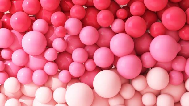 istock Various size of red and pink balloons abstract background 1908691298
