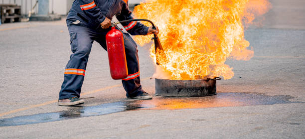 istock Fire training and drills for factory workers, for fire protection and safety. 1908698283