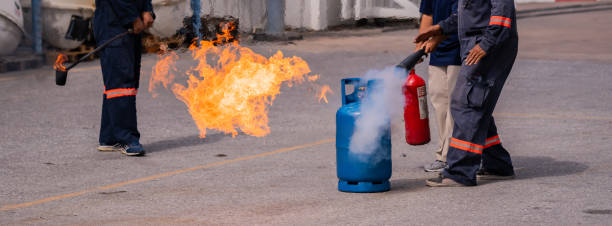 istock Fire training and drills for factory workers, for fire protection and safety. 1908698284