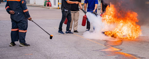 istock Fire training and drills for factory workers, for fire protection and safety. 1908698287