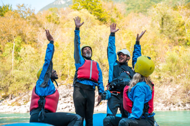 istock Team Achievement in River Rafting for Diverse Adults 1908707694