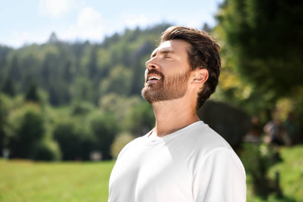 istock Feeling freedom. Man enjoying nature outdoors on sunny day, space for text 1908718153
