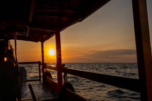 istock Beautiful sunset over the water. 1908727187