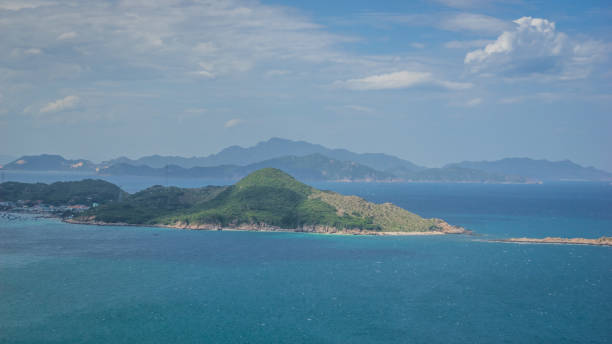 istock Coast with clear blue water and small islands in Phan Rang Ninh Thuan Vietnam 1908782202