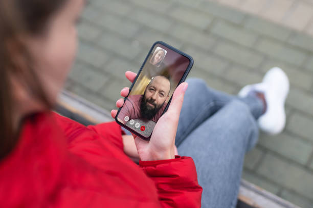 istock Woman uses a smartphone for video call with a friend or husband 1908876720