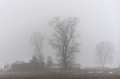 An abandoned village in thick fog