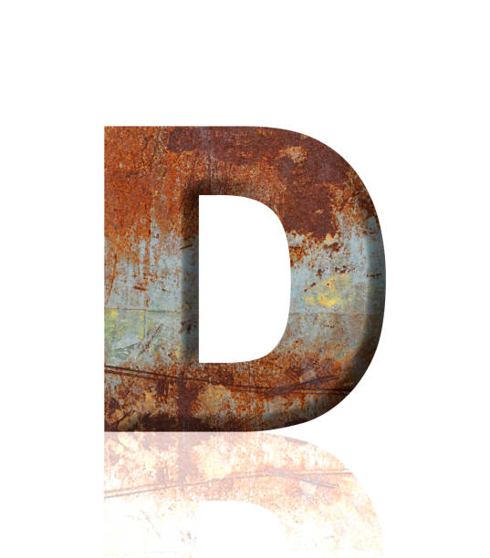 istock Isolated shot of three-dimensional rusty metal alphabet letter D on white background 1908906727