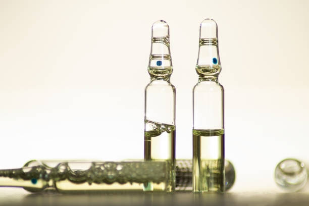 istock The ampoules with the medicine are on the table. soft focus 1908980566