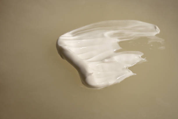 istock A smear of cream on a light background. Beauty concept. 1908980574