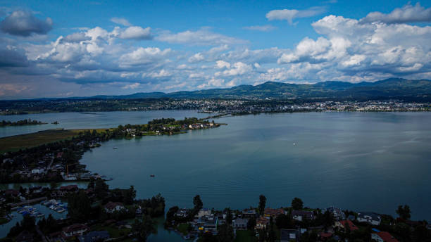 istock Lake shore with water flowing in the middle 1908981617