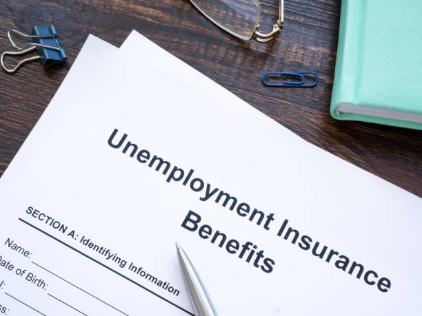 istock Unemployment Insurance benefits application for signing. 1909016764