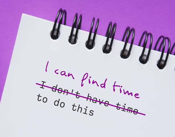 istock Notebook on purple background with text written I DONT HAVE TIME TO DO THIS, changed to I CAN FIND TIME TO DO THIS - to replace negative thoughts to positive affirmation with growth mindset 1909062563
