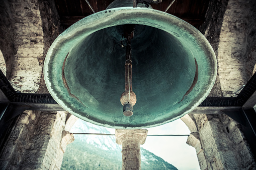 Image of hanging ringing bell in temple gate