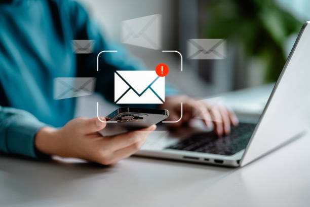 istock Women using smartphones check email notifications inbox have spam viruses message with warning caution, junk and trash mail, security terms cybersecurity concept 1909103324