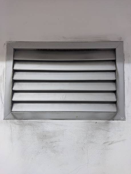 istock Old Metal air duct in closed up perspective 1909123979