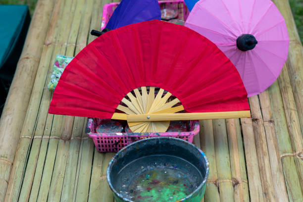 istock Stylish Red paper fan 1909140468