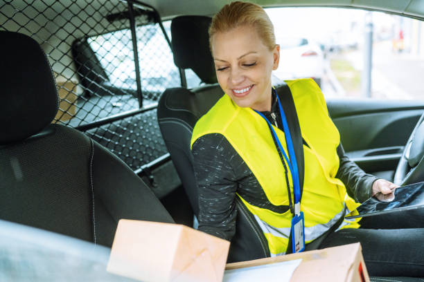istock Delivery courier in the car 1909179449