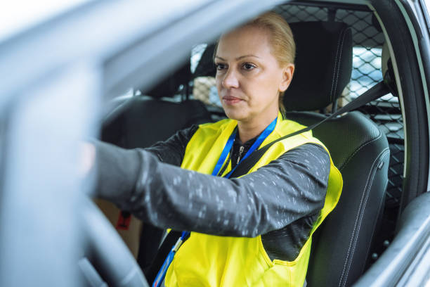 istock Delivery courier in the car 1909181099