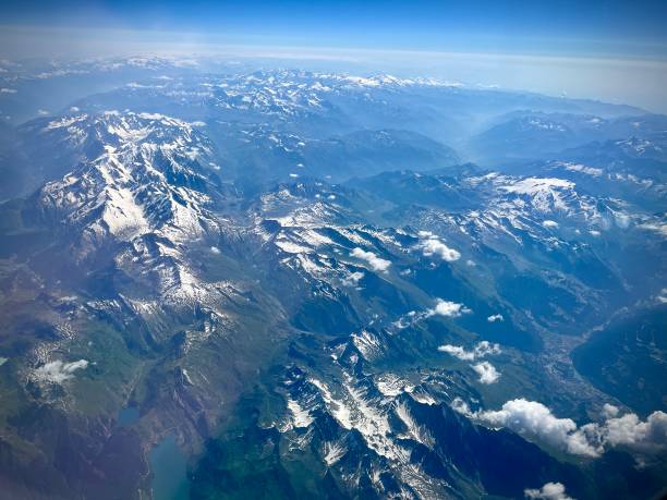 French and Swiss Alps overview from the sky Aerial photograph of French, Swiss and Italian Alps with identifiable summits and valleys crans montana stock pictures, royalty-free photos & images