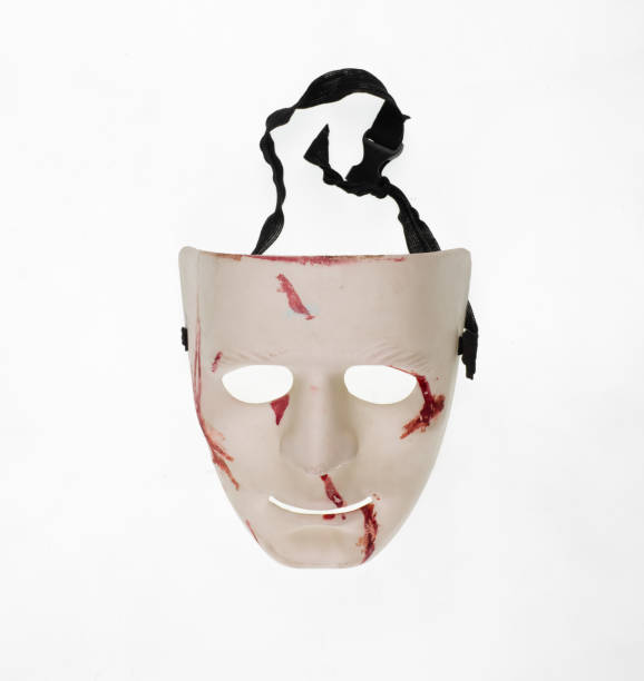 istock white theatrical mask with blood isolated on white background 1909254744
