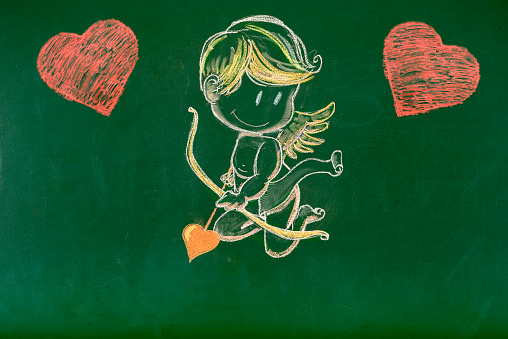 Cupid sketched on blackboard for Valentine's Day.