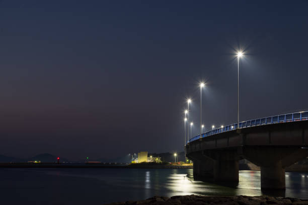istock The sea and bridge before dawn 1909261650