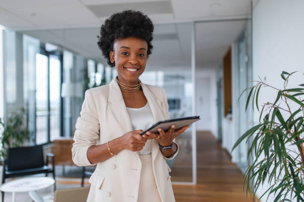 istock Confident Black Businesswoman with Digital Tablet 1909268599