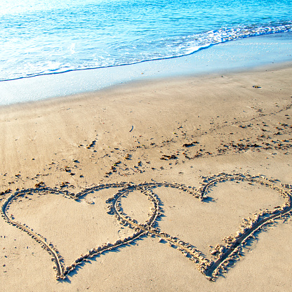 Heart Shape sketched on the sand. Copy Space.