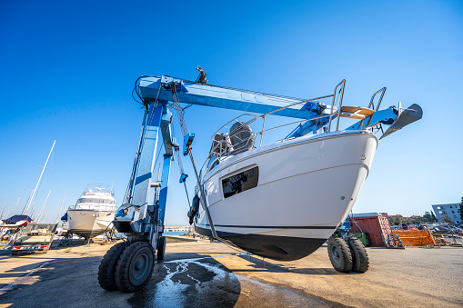 Car towing a boat. Lake Powell beach, parking lot.  Lake Powell, Utah, USA - September 29, 2021