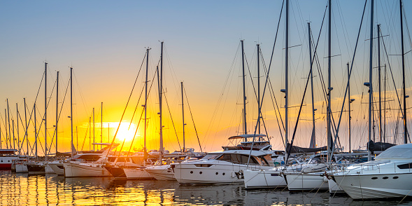 Sailing boats in marina at sunset, Izola, Slovenia.