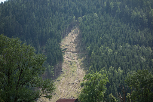 storm damage caused by mudslides, debris and mud after heavy rainfalls