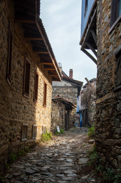 istock narrow street in old town 1909335425