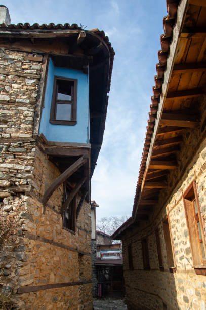 istock narrow street in old town 1909344354