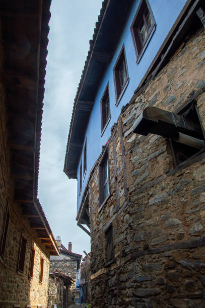 istock narrow street in old town 1909347022