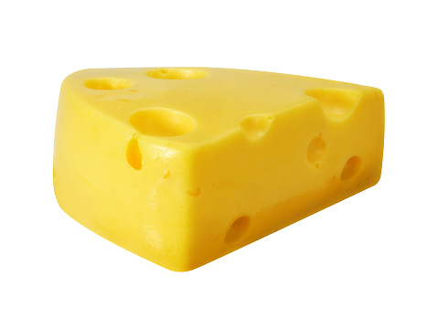 close-up of a piece of cheese with holes