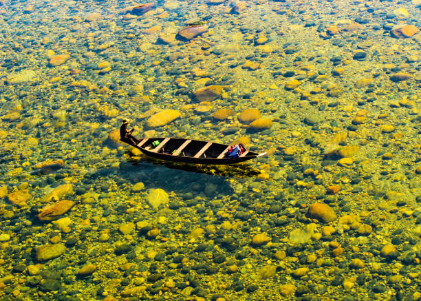 istock Clear water boating at dawki 1909350630