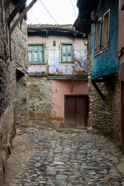 istock narrow street in old town 1909371713