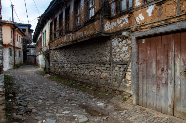 istock narrow street in old town 1909372075